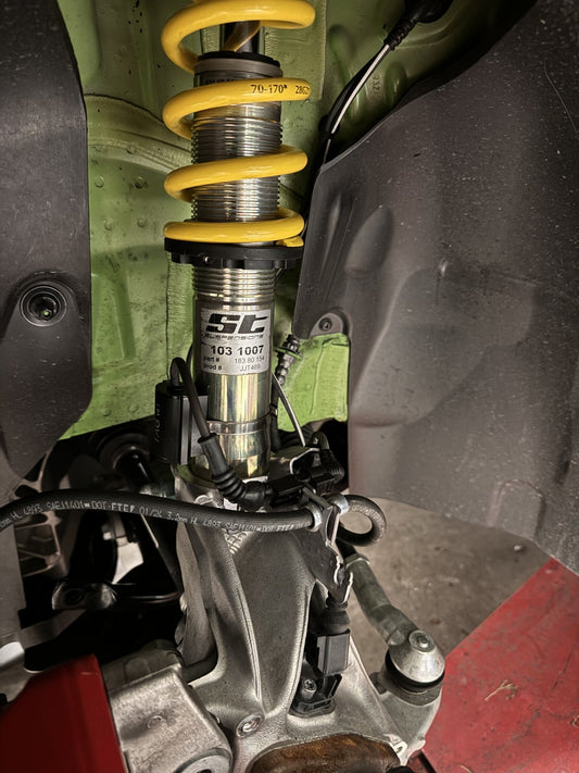 Aftermarket Coilovers + Adaptive Suspension: What to Know Before You Drop Your Car